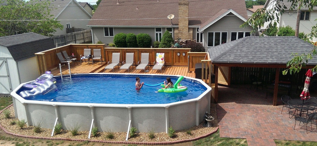 Above Ground Pool Connected Side Deck to a Brick Patio