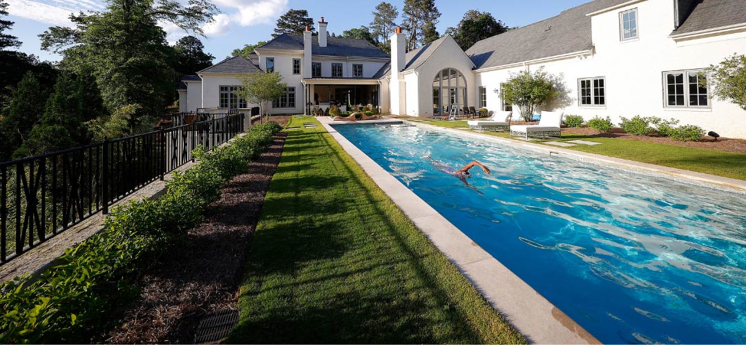 Rectangular Pool with Swimmer| Pool & Hot Tubs Alliance | History of Pools