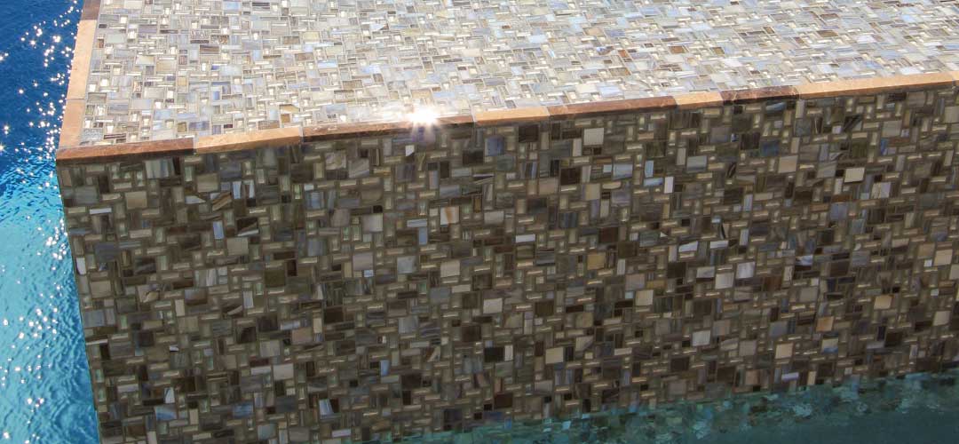 cosmopolitan latte silver gold and silver glass mosaic pool tile with beige grout