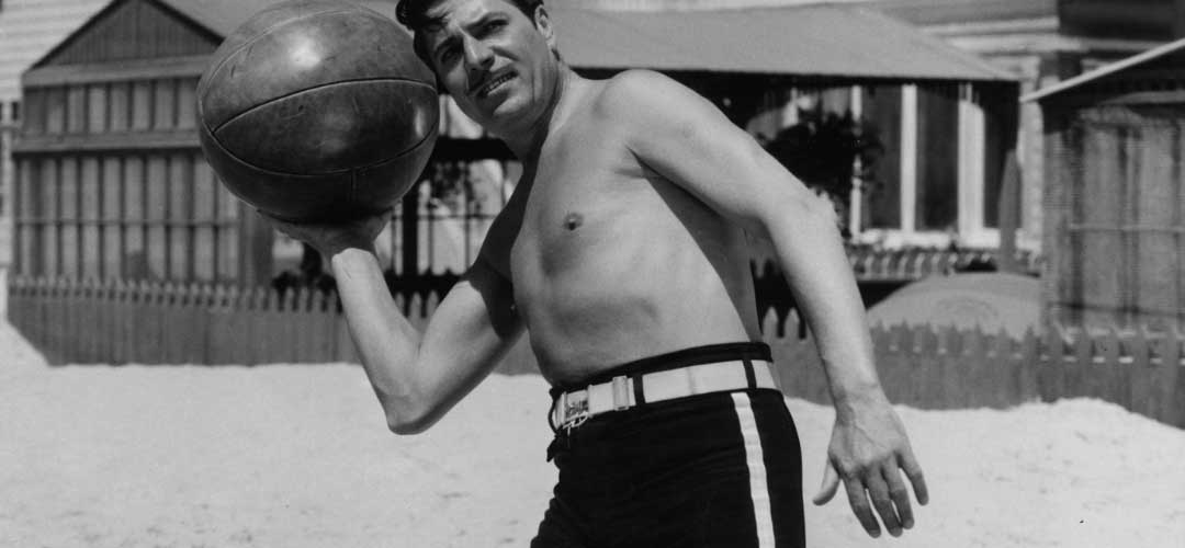 Actor Warner Baxter Model Swimsuit Style, Swim Shorts with a White Belt.
