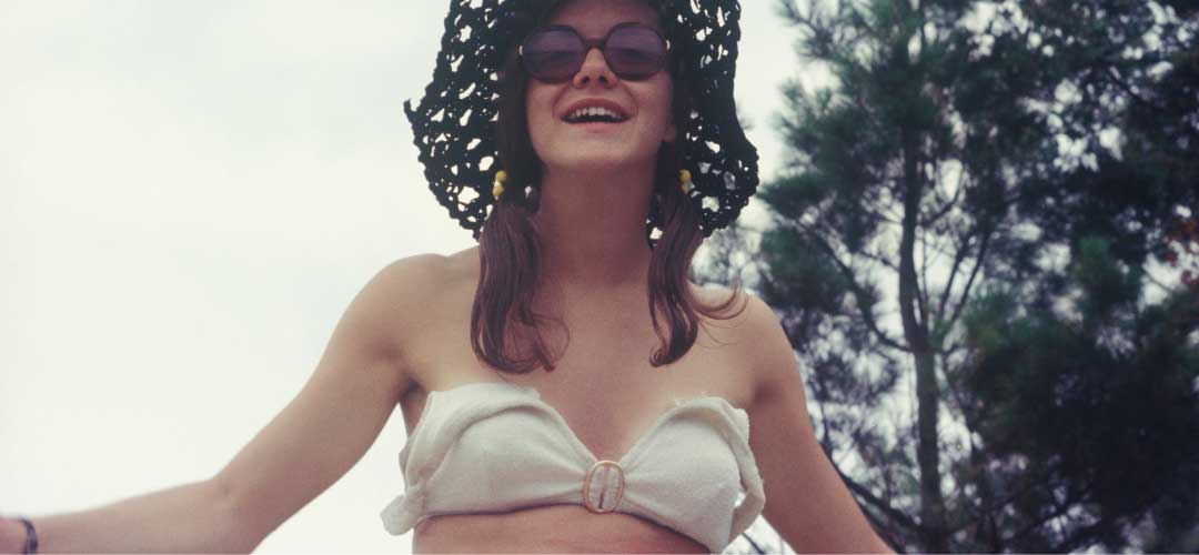 Woman in the 70s with a Sunhat and Bikini
