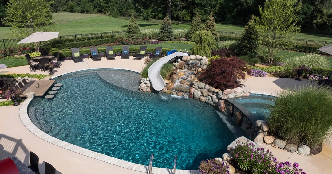 Outdoor Pool with Slide and Landscaping
