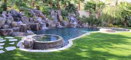 Backyard swimming pool with grotto