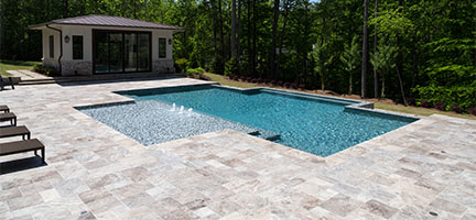 Outdoor pool by forest