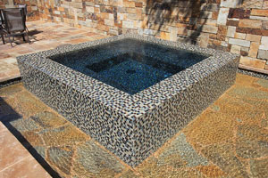Rustic - Raised Spa with Rocky Spillover Ledge