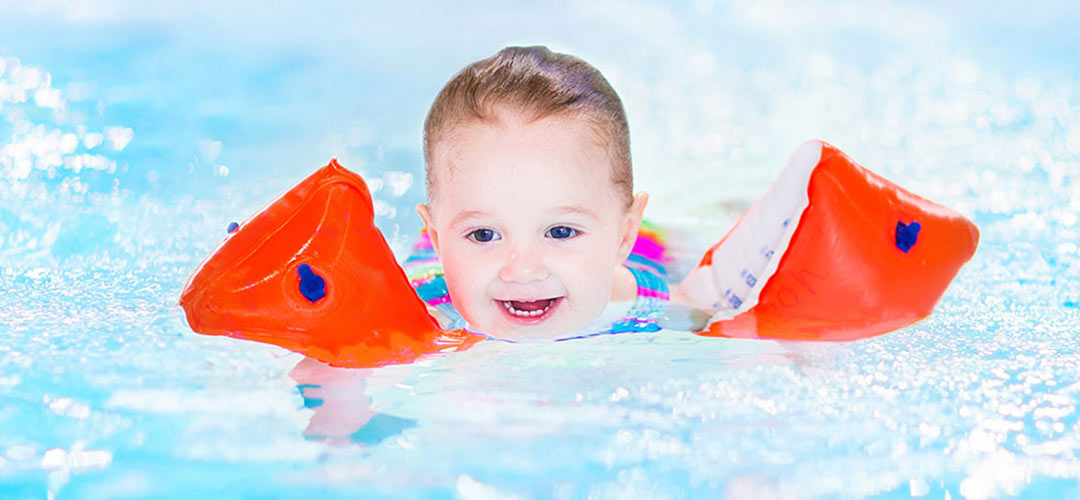 Child Swimming with Floaties